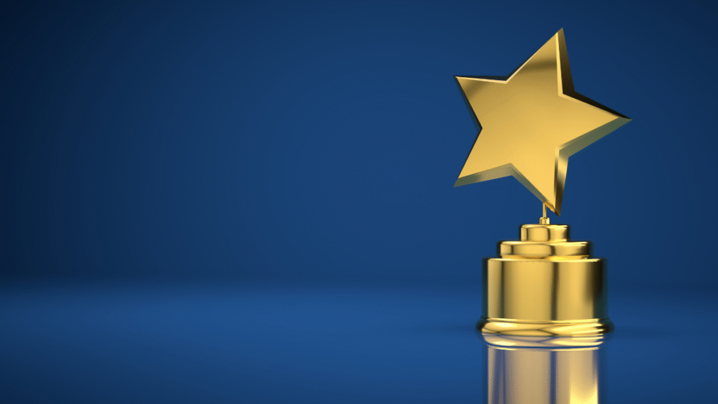 An image of a trophy award against a blue background