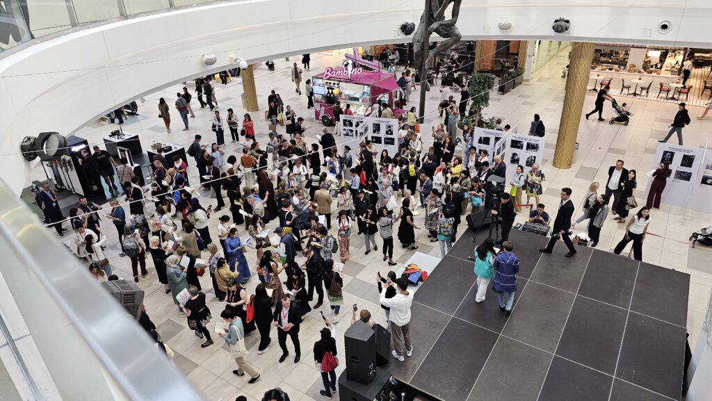 A group of people gathered reading books