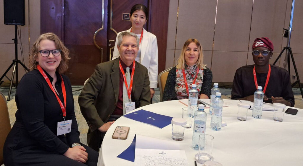 A group of people sitting around a table